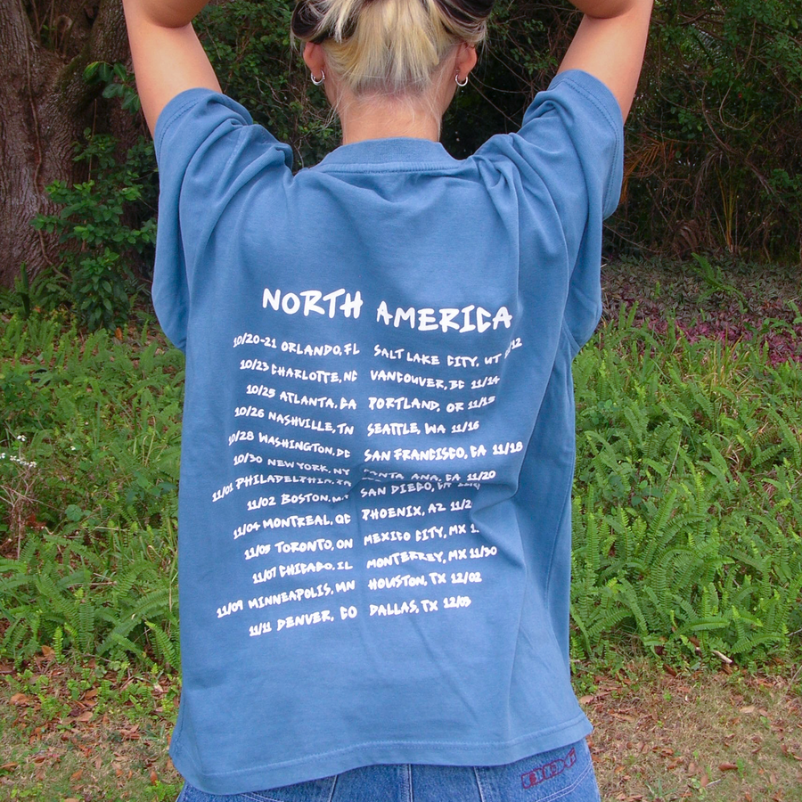 hannah bahng showing back of misunderstood tour shirt north america dates
